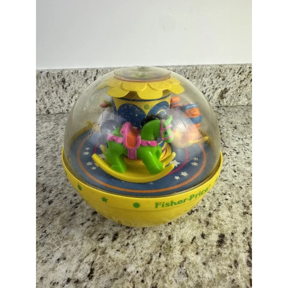 Vintage 1985 Fisher Price Roly Poly Chime Ball Carousel Yellow 1150 nostalgia